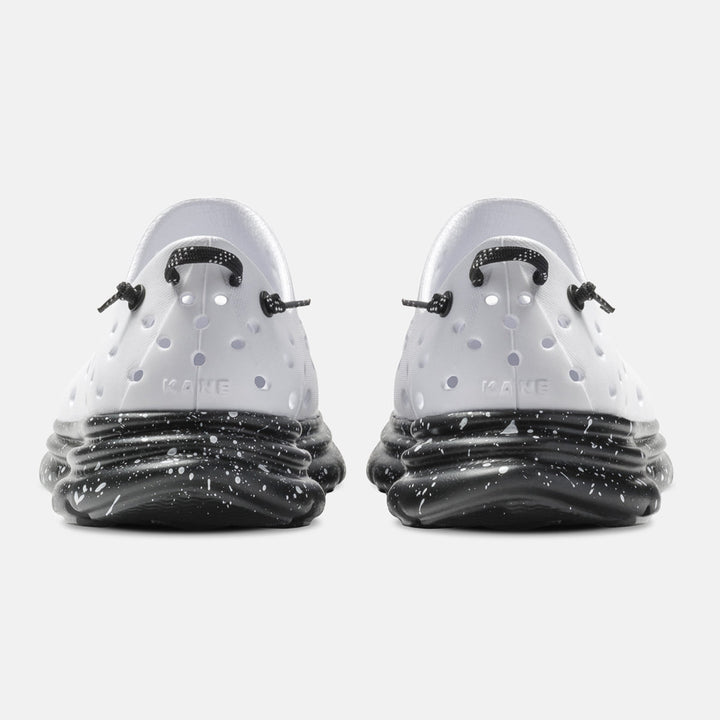 Kane Revive unisex recovery shoe in White / Black Speckle, back view