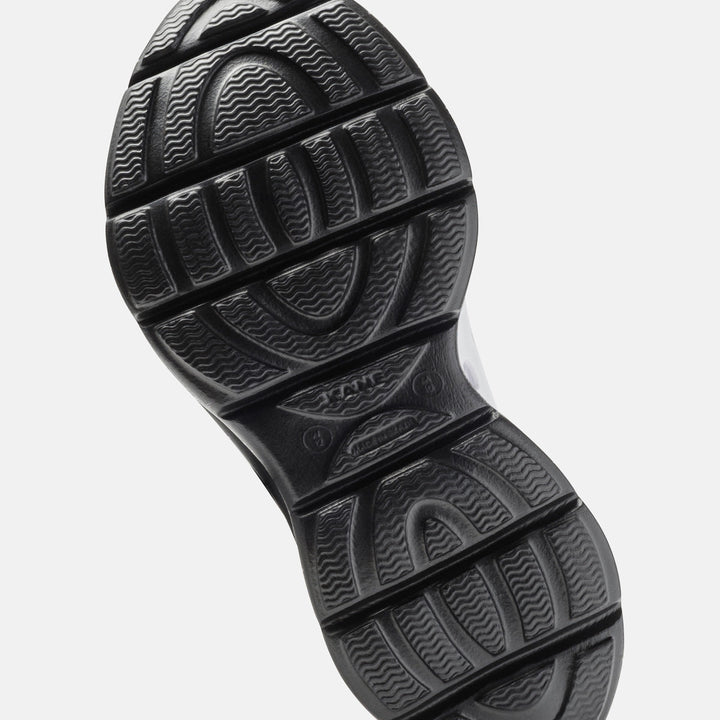 Kane Revive unisex recovery shoe in White / Black Speckle, bottom view